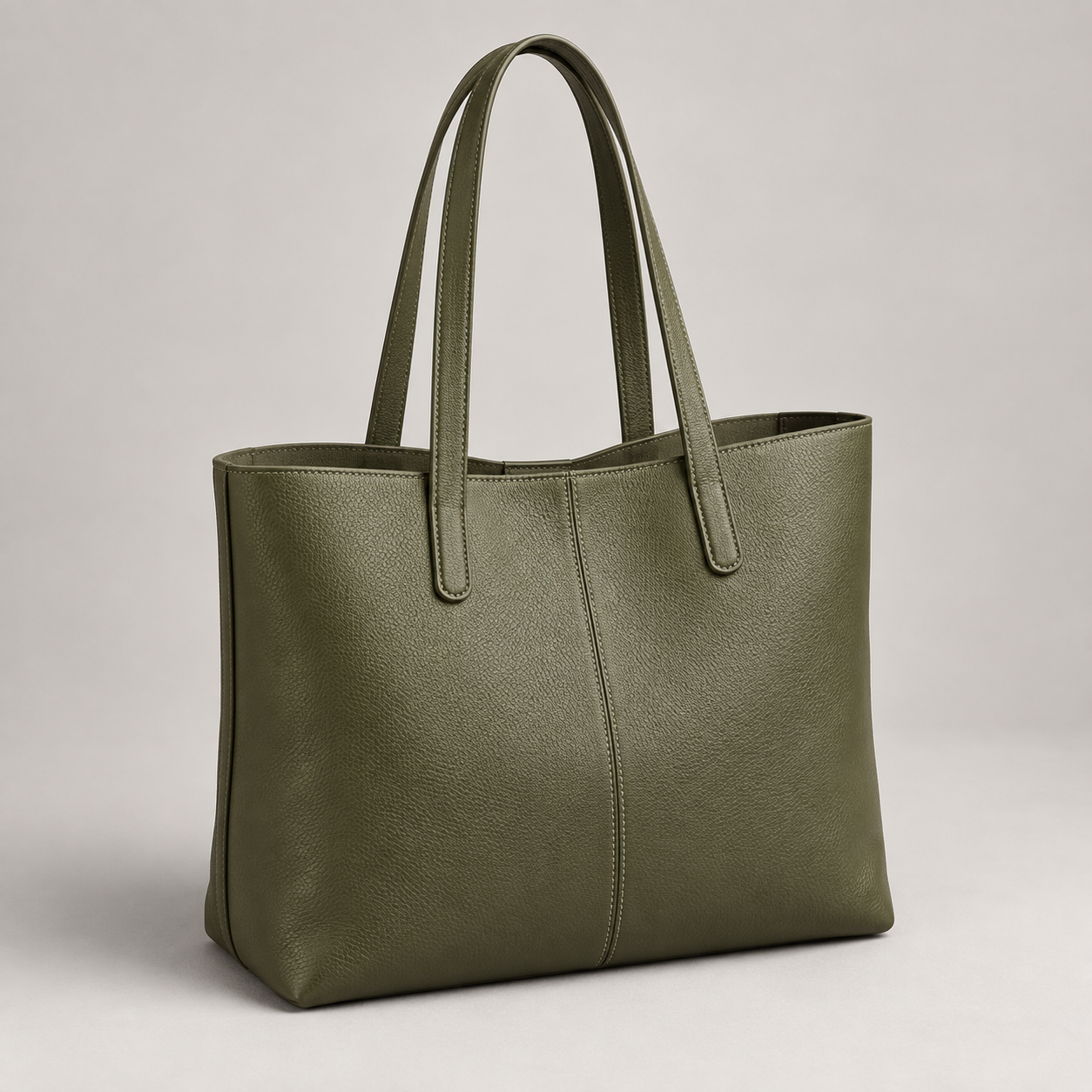Olive Work Tote: Open work-tote silhouette with long handles, an upright body and a subtle front seam. Illustrative design reference.